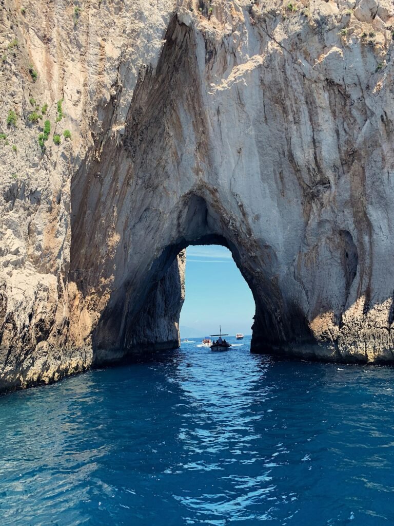 pexels-photo-2928012-2928012 Stunning rock archway over blue waters at Capri, Italy, capturing natural beauty.